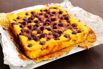 Homemade yummy quark pie with cherries baked in foil