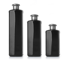 Black cosmetic bottles