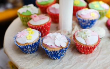 Served festive candy bar table with cupcakes