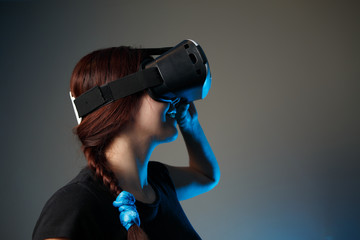 Woman using the virtual reality headset