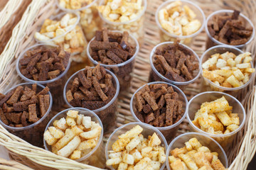 Croutons snack in plastic cups for party