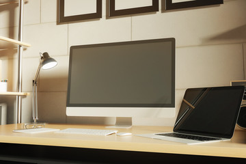 Computer monitor and laptop closeup