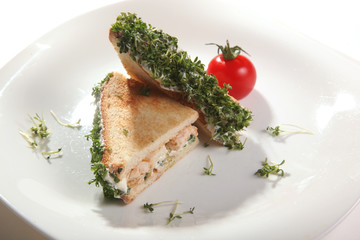 Fish sandwich on plate