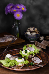 Preparation of sandwiches with herring, selective focus, still life