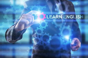 Businessman is selecting Learn English.
