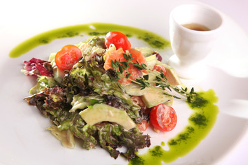 Salad with meat and pesto sauce