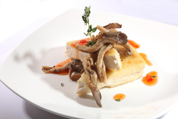 Casserole with mushrooms on plate