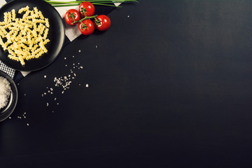 Food ingredients background. Photograph taken from above, top view. Horizontal concept image for restaurant advertising or mock-up. Lots of copy space for text around objects