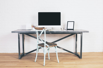 Antique chair at designer desk