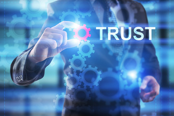 Businessman is selecting Trust. 