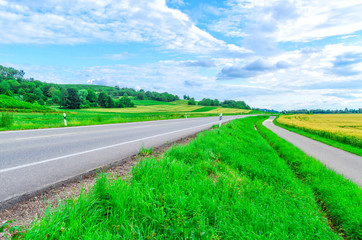 Rural field runs along the federal highway in Germany 