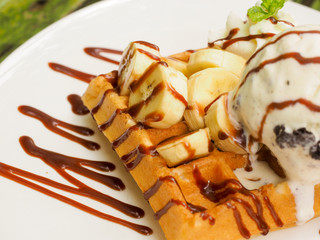 Waffle with ice cream, chocolate and mint