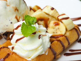 Waffle with ice cream, chocolate and mint