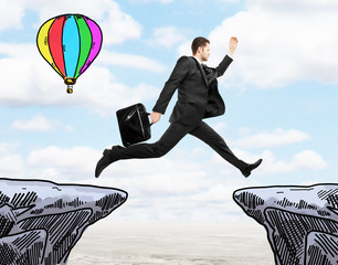 Success concept with jumping man