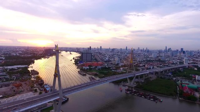 aerial view of bhumiphol bridge crossing river in bangkok thailand