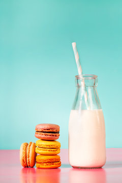 Stack of macarons with botle of milk