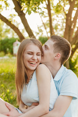 Portrait of Happy Couple Hugging Laughing