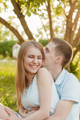 Naklejka premium Portrait of Happy Couple Hugging Laughing