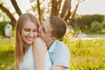 Portrait of Happy Couple Hugging Laughing