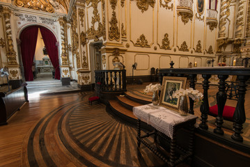 Catholic church interior with many decorations