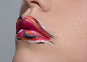 beauty woman lips with creative makeup