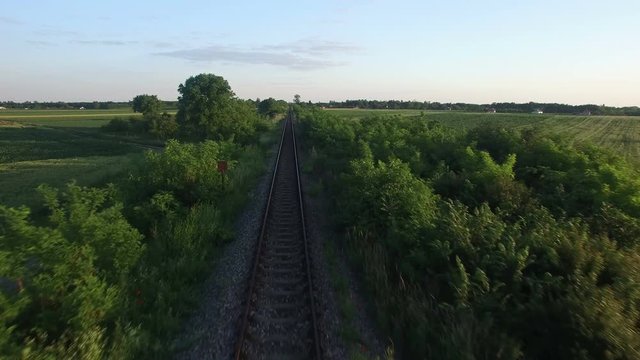 Low flight over the railroad with surrounding wheat fields. Sombor, Serbia.