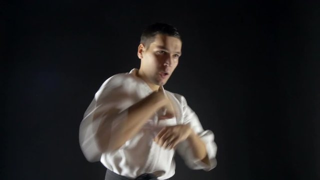 karateka trains elbowing