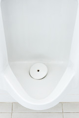 Fototapeta premium Closeup of dirty white urinals