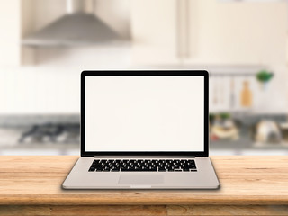 blank screen notebook with kitchen background