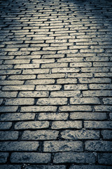 Dark Old cobblestone street