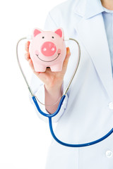 medical insurance, piggybank with stethoscope