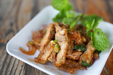 Sliced grilled pork salad