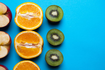Healthy fruits on a blue background from above