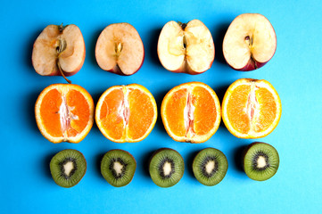 Healthy fruits on a blue background from above