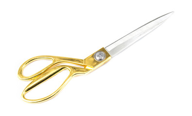 Fototapeta premium A gold tailoring scissors isolated on white background