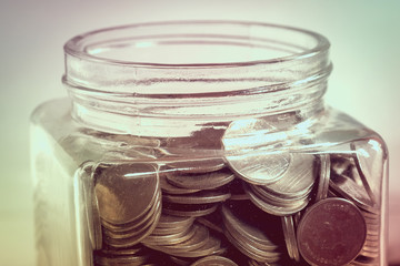 save money for investment concept money in the glass with filter