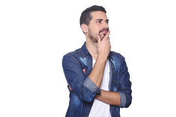 Portrait of young latin thoughtful man.