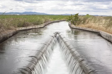 Papier Peint photo Canal Floodgate area at huge irrigation canal, Extremadura, Spain