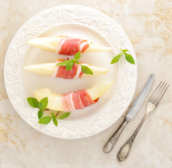 Becon and melon. Ham. Traditional Spanish dish