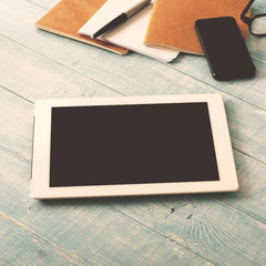 White tablet computer with blank screen