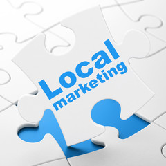 Marketing concept: Local Marketing on puzzle background