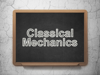 Science concept: Classical Mechanics on chalkboard background