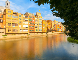 Fototapeta premium Colorful yellow and orange houses in Girona, Catalonia, Spain.