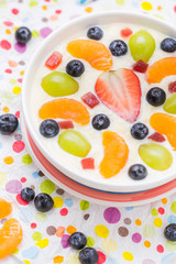 Delicious milky vanilla pudding colorful fruit