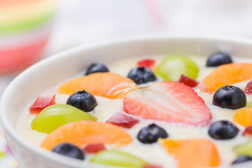 Delicious milky vanilla pudding colorful fruit