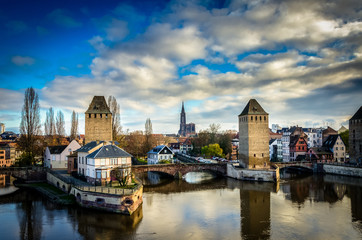 Fototapeta na wymiar Panoramic view on Ponts Couverts and Cathedral in Strasbourg