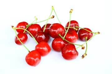 Obraz na płótnie Canvas Fresh cherries on white background 