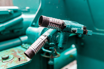 Military green background with artillery mechanism