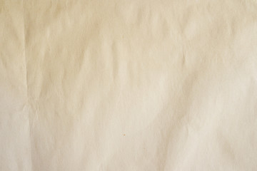 Beige parchment sheet as background. Old paper texture.