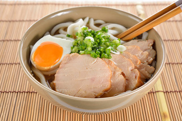 Japanese noodles, Udon with chicken and boiled egg in soybean pa